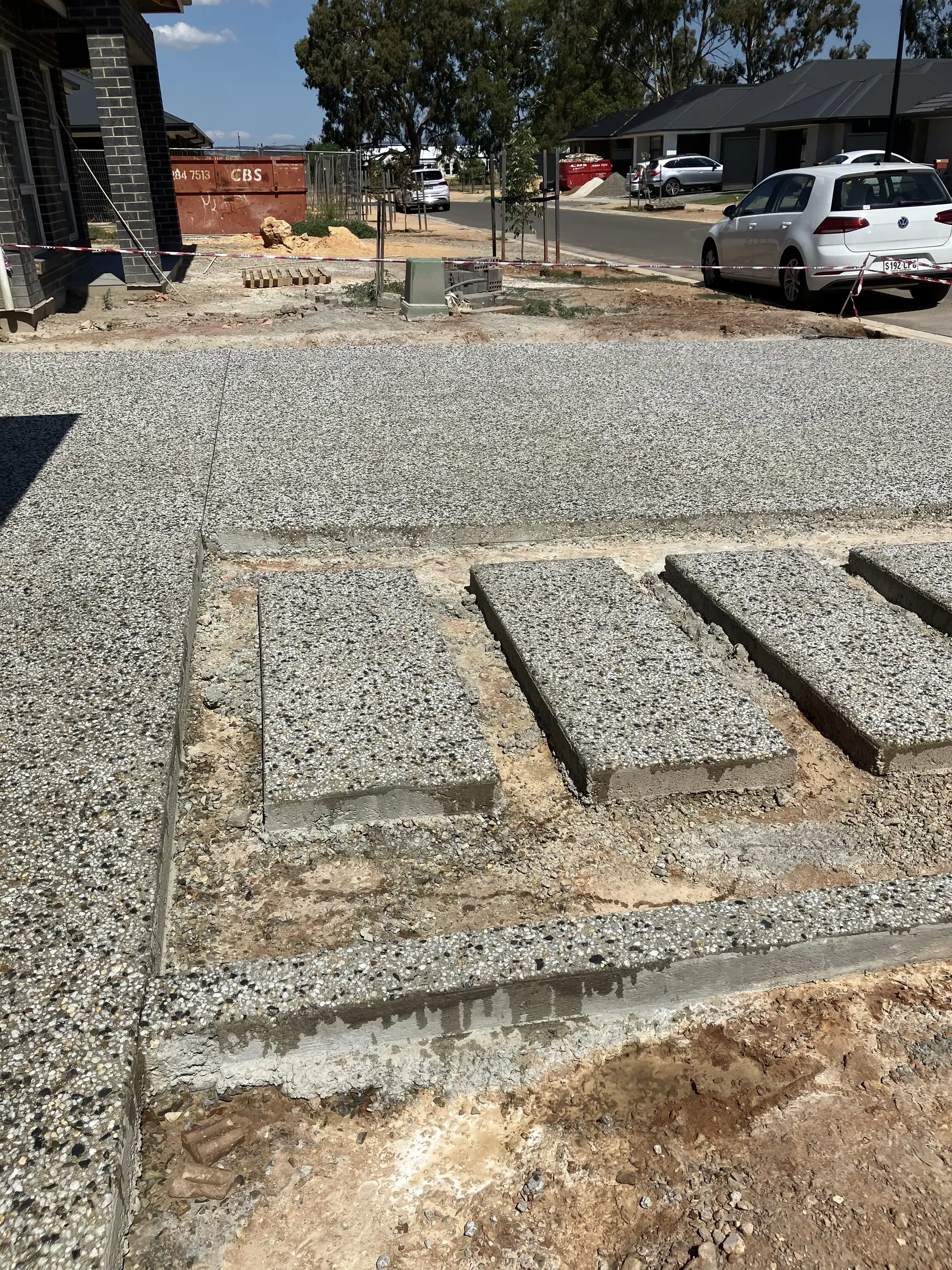 Exposed aggregate concrete steps.